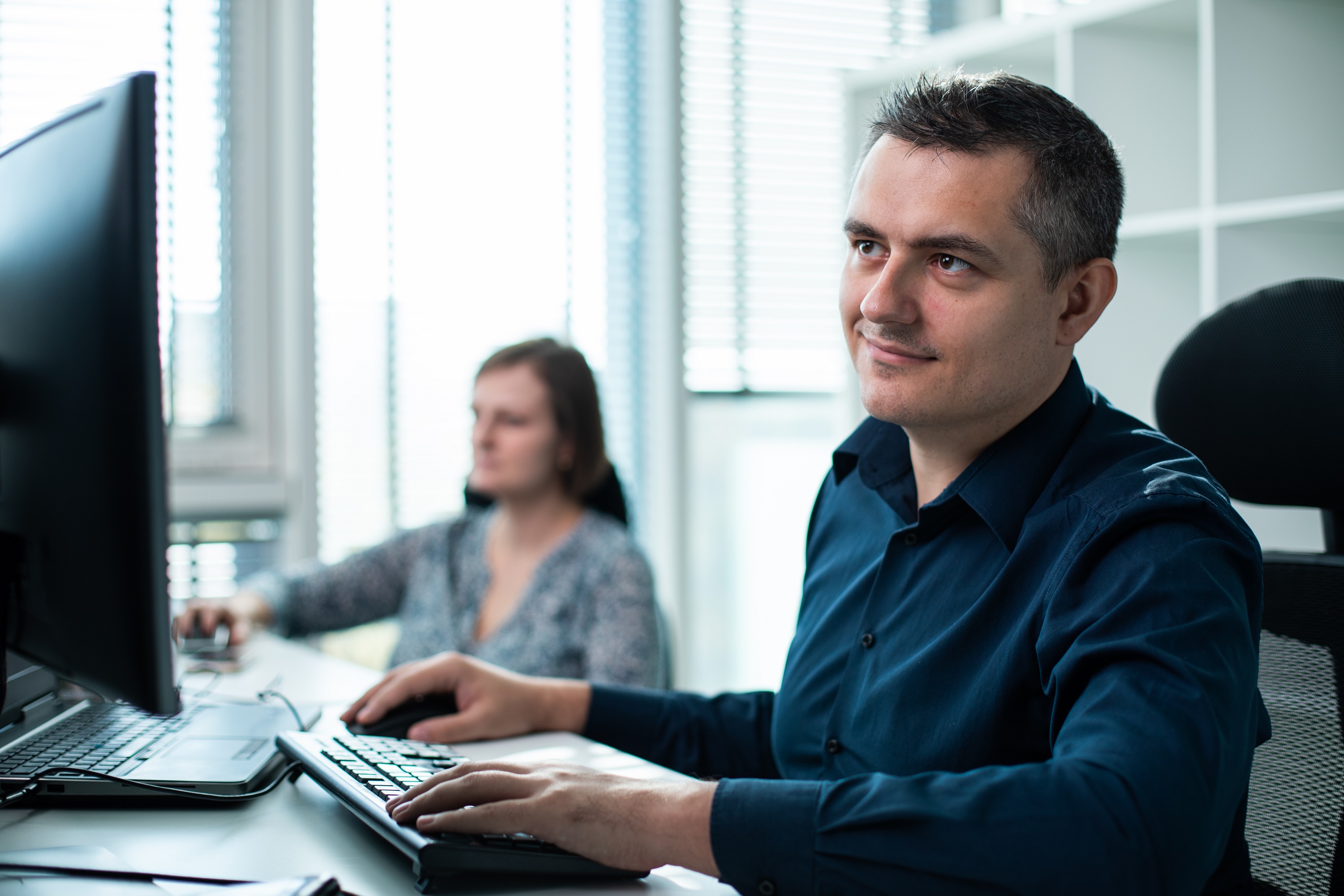 Programiści Droptica pracujący nad projektami dla CTO, CIO i ich zespołów.